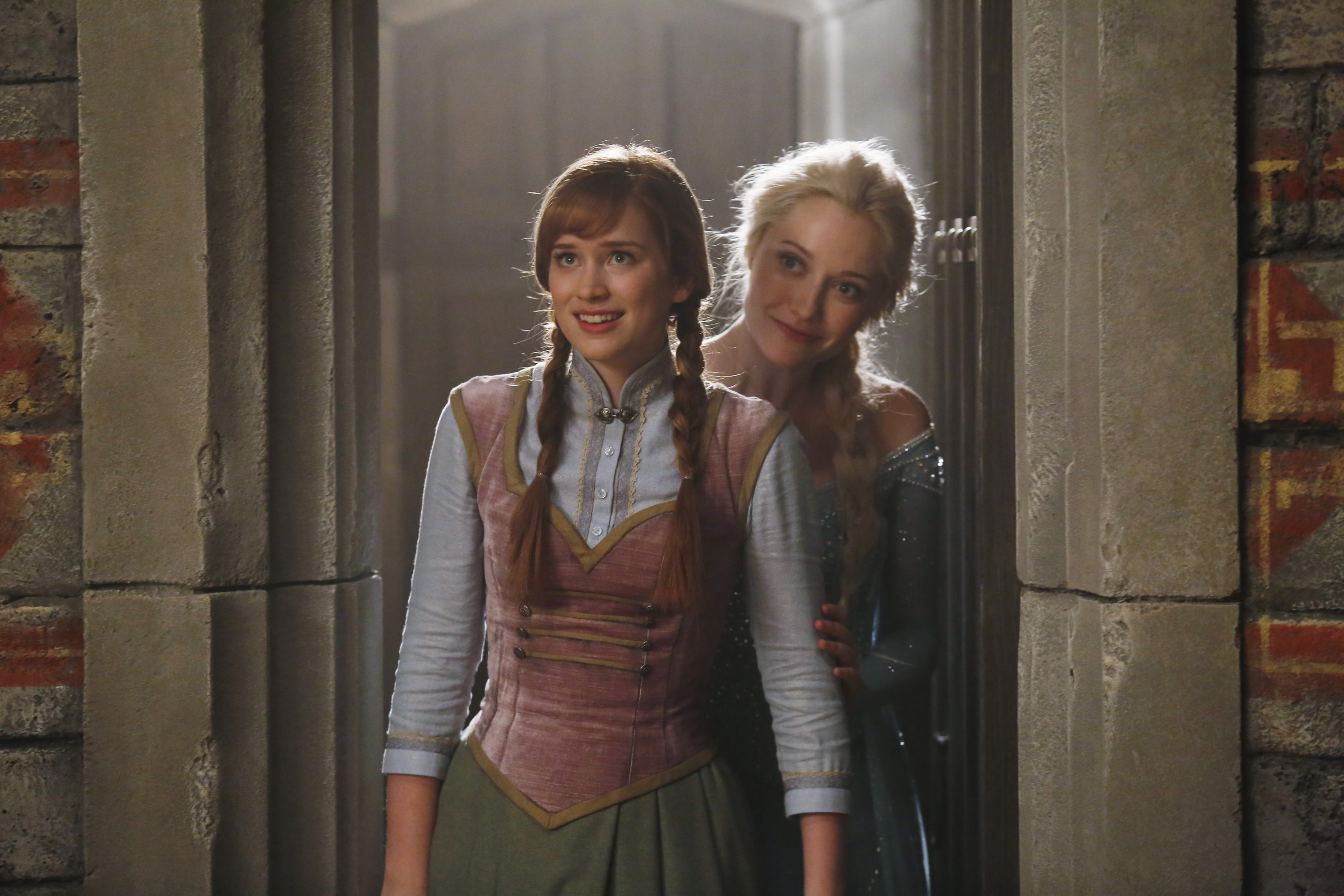 ONCE UPON A TIME - "A Tale of Two Sisters" - A scared and confused Elsa finds herself in Storybrooke and, fearful of the intentions of its residents, creates a powerful snow monster for protection. With Robin Hood's wife, Marian, back in the picture, Regina wonders if her "happily ever after" with the former thief has been completely quashed; while on their honeymoon, Mr. Gold finds an intriguing object that makes him question whether or not he should officially give Belle control over the dagger that makes him The Dark One, and Hook is dismayed to discover that Emma seems to be avoiding him while she tries to help comfort Regina after being the one responsible for bringing Marian back from the past and into Storybrooke. Meanwhile, in Arendelle of the past, as Elsa's sister Anna's wedding to Kristoff nears, Anna discovers that their parents - who died on-ship during a violent storm - were heading to a mysterious destination in a quest that may have held the secret to containing Elsa's out of control Ice powers. And against Elsa's wishes, Anna wants to finish their journey to find out what they were looking for, on "Once Upon a Time," SUNDAY, SEPTEMBER 28 (8:00-9:00 p.m., ET) on the ABC Television Network. (ABC/Katie Yu) ELIZABETH LAIL, GEORGINA HAIG